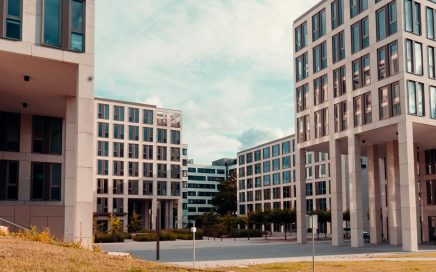 Contemporary office buildings in Wiesbaden, Germany under a cloudy sky, showcasing urban design.