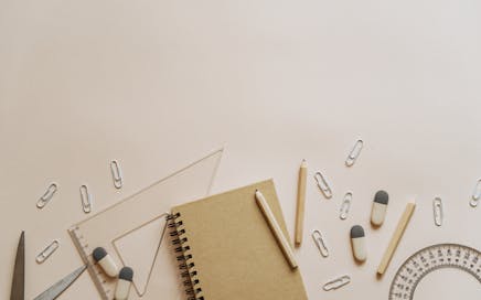 Top view of school supplies with ample copy space, perfect for educational themes.